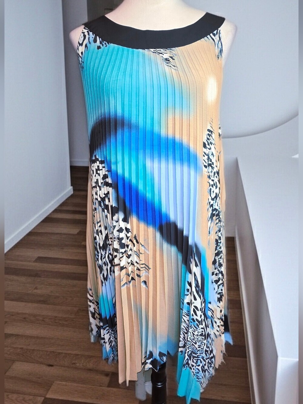 665. Essentials by Milano Pleated Trapeze Dress Blue Leopard Print Abstract